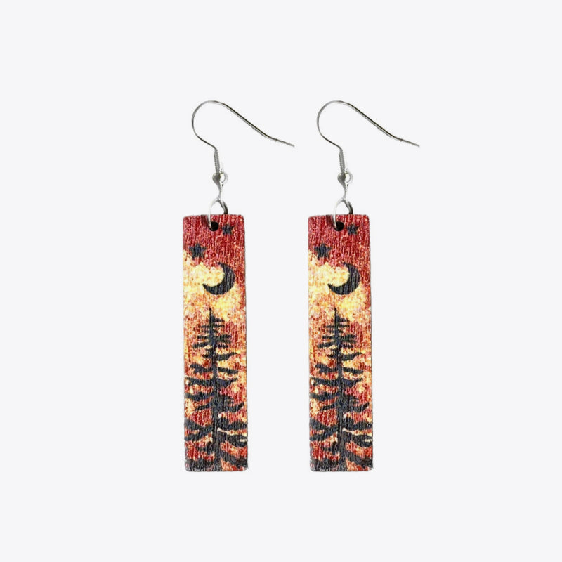 Painted landscape dangle earrings with moon and trees, red and yellow sky, boho style.