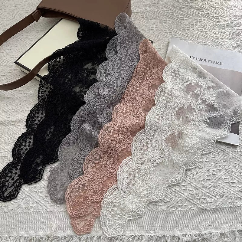 Delicate floral lace scarves in black, gray, pink, and off-white with scalloped edges.