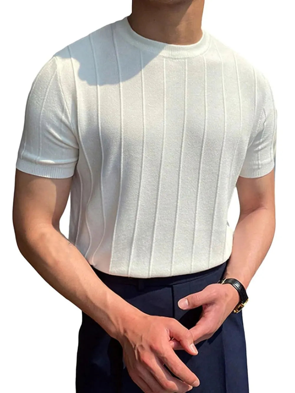 Ivory ribbed knit crewneck tee with vertical stripes and short sleeves.