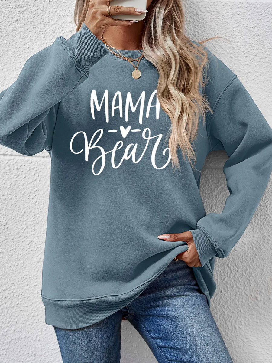 Light Blue Mama Bear graphic sweatshirt with crewneck and long sleeves.