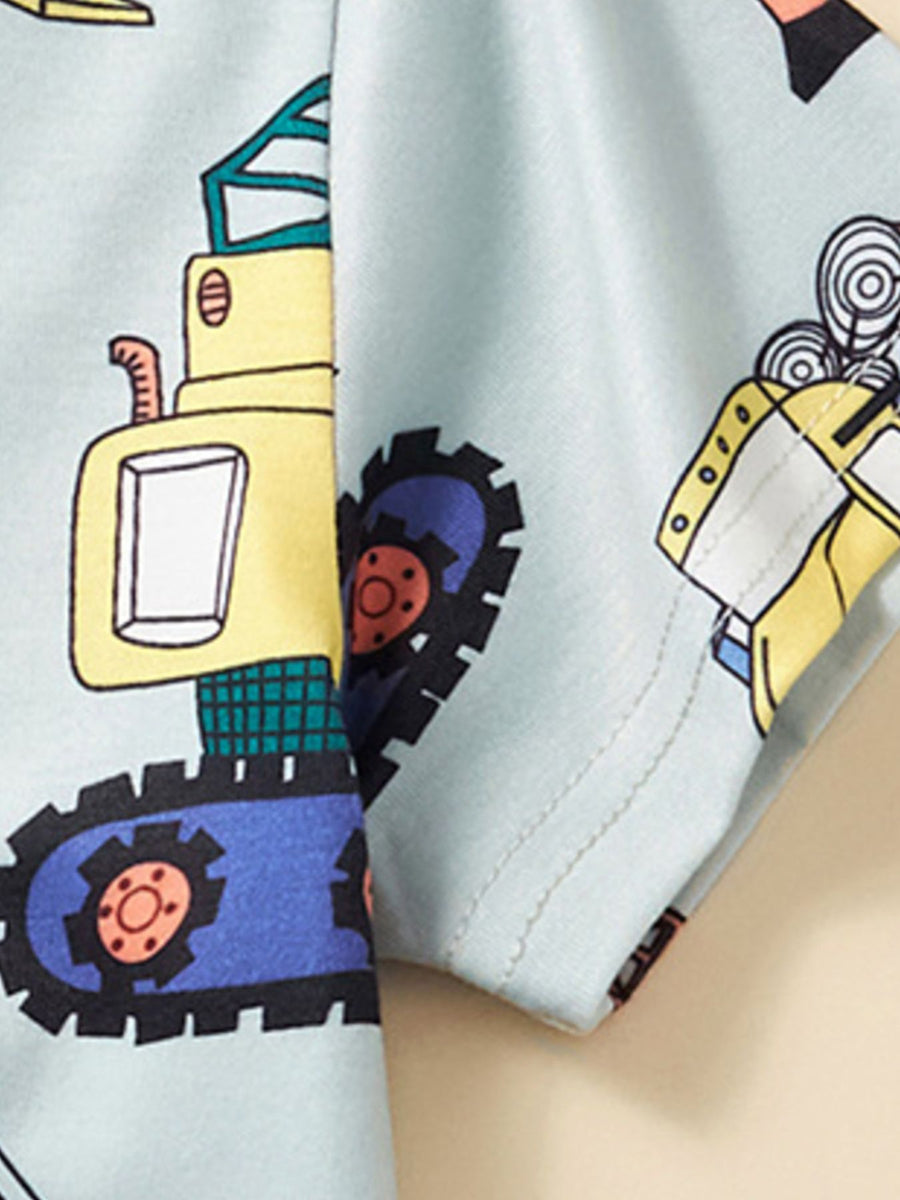 Toddler t-shirt with construction vehicle print in blue, yellow, and black.