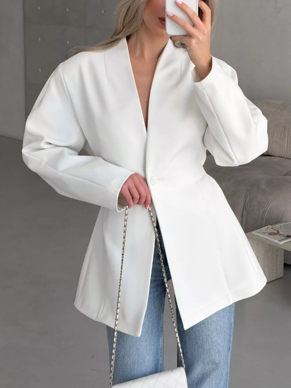 blazer in white featuring one-button closure and A-line fit