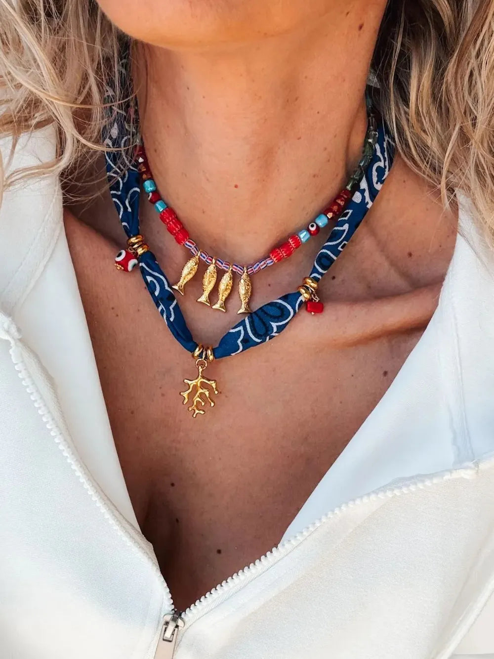red necklace featuring 2-piece set and paisley