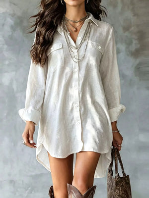 shirt dress in ivory featuring buttoned and relaxed fit