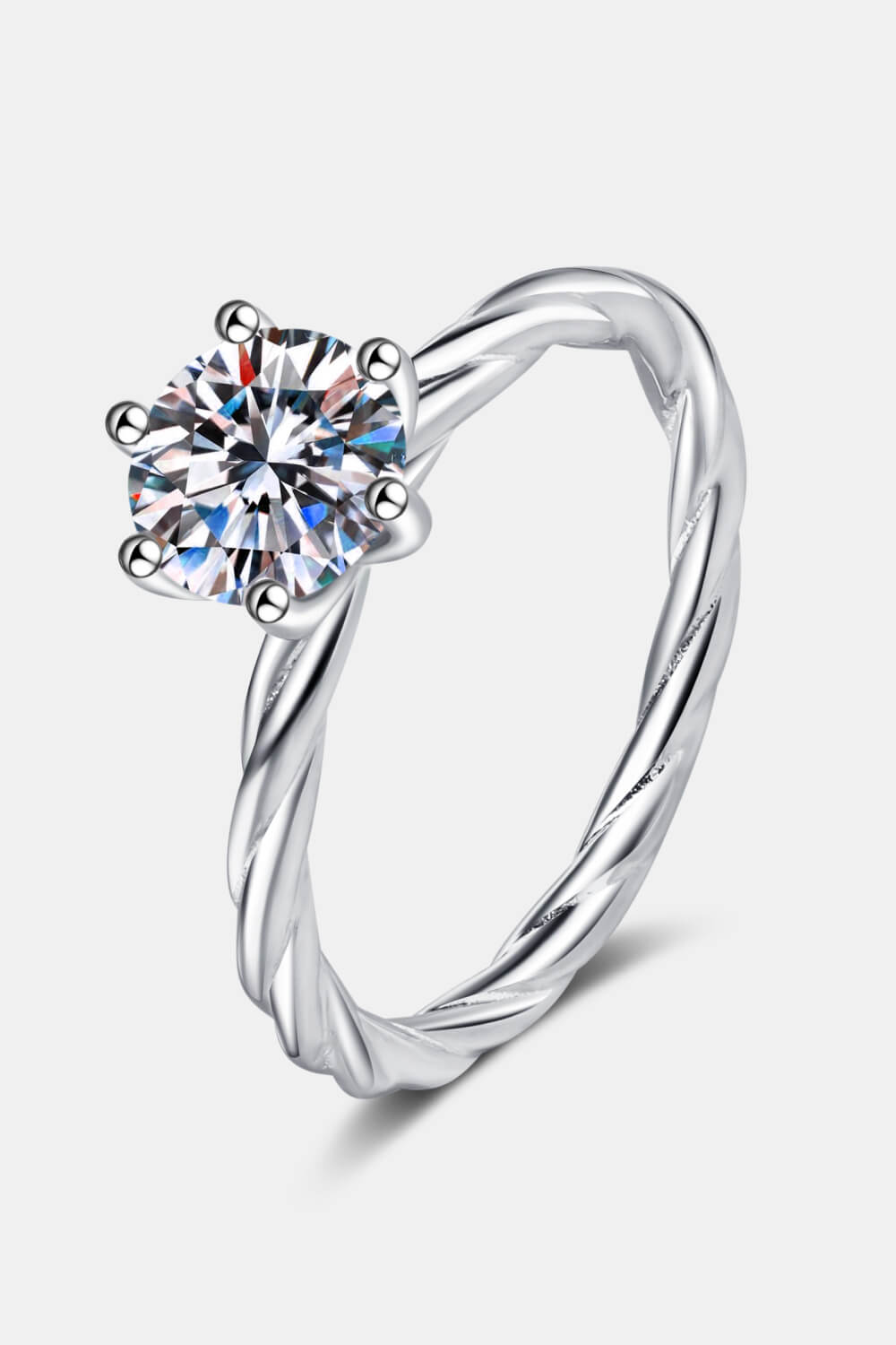 Silver twisted band moissanite solitaire ring with six prongs