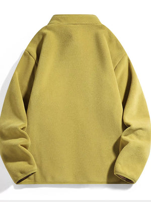 Fleece lined zip-up jacket in mustard yellow with a stand-up collar.