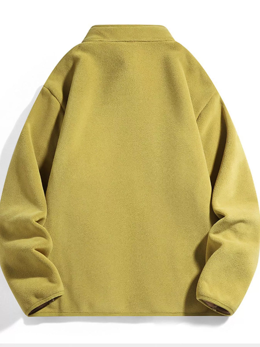 Fleece lined zip-up jacket in mustard yellow with a stand-up collar.