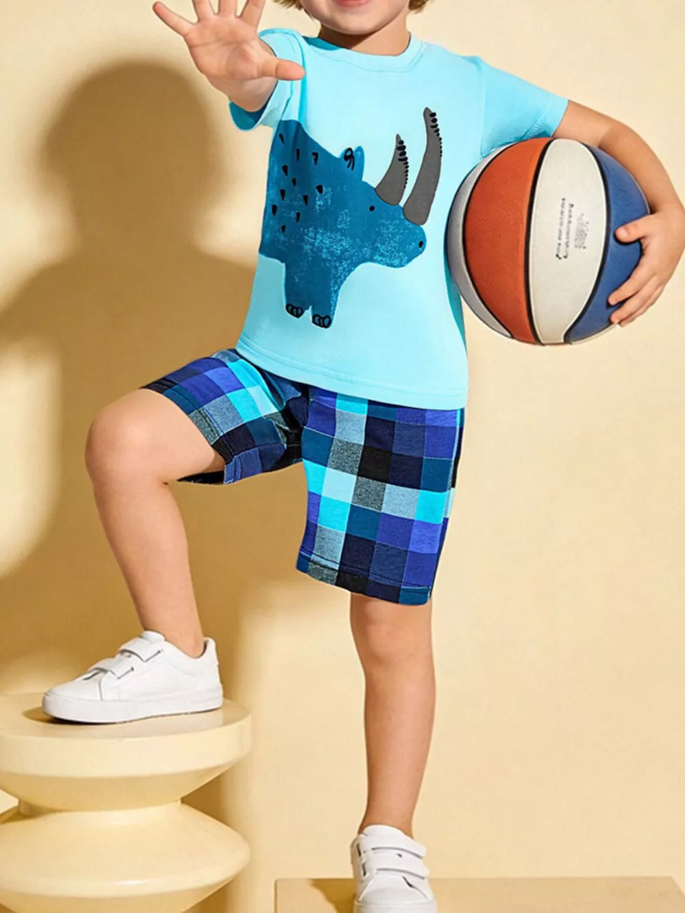 Baby blue rhino graphic tee and blue plaid shorts set for boys.