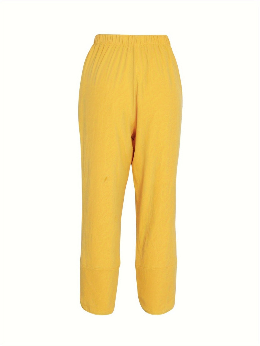 Yellow relaxed fit wide-leg pants with elastic waist and cuffed hem