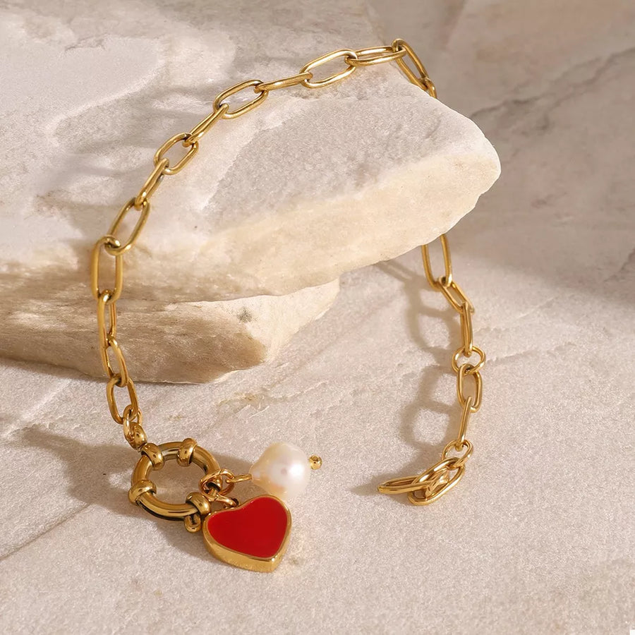 Gold bracelet with n/a and clasp