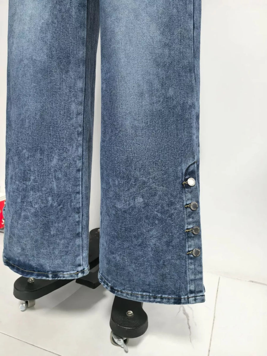 Wide-leg denim jeans in blue with button accents on the side hem