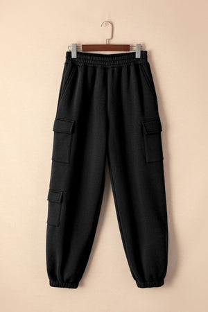 Black cargo pocketed relaxed joggers with elastic waistband and cuffs.
