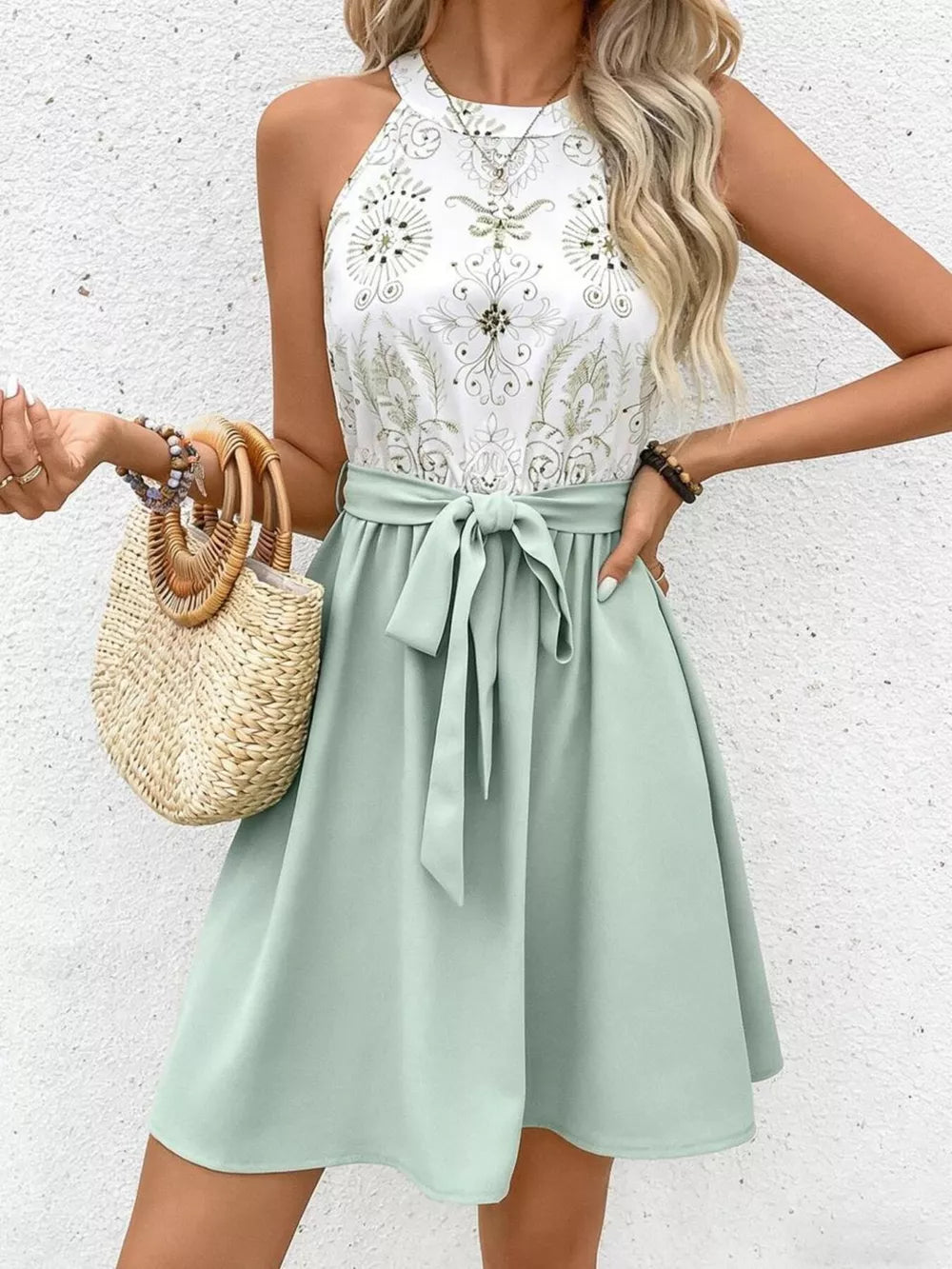 Floral print halter neck a-line dress in white with sage green skirt and tie waist detail
