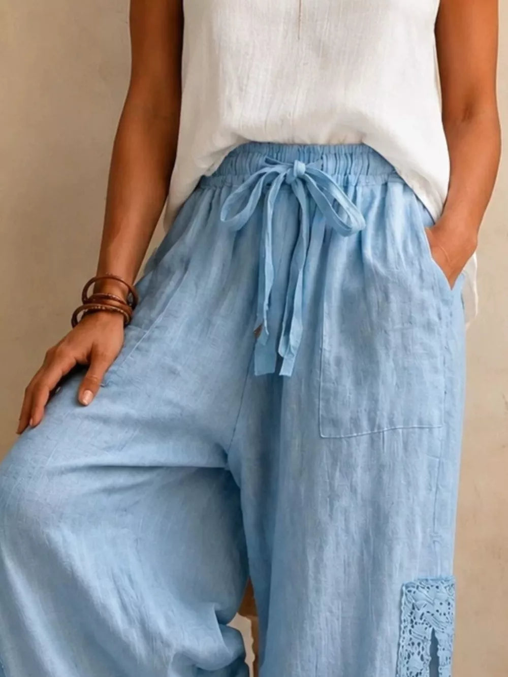 100% polyester Care instructions: Machine wash cold wide-leg pants in Light Blue with flared silhouette