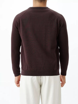 Men's brown cotton knit polo with ribbed sleeves and collar.