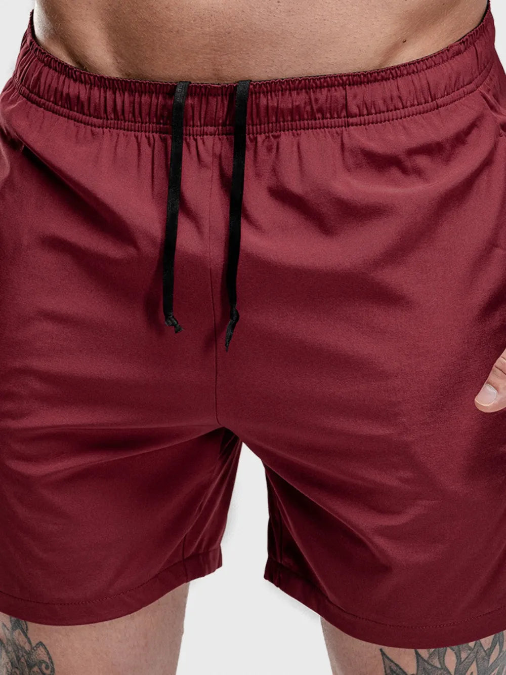Burgundy performance shorts with drawstring and split hem