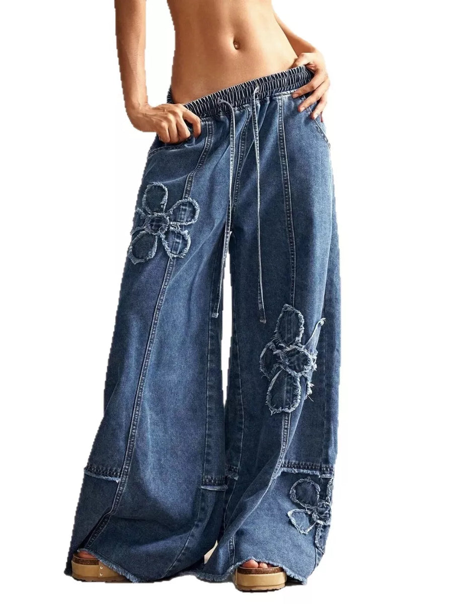 Wide leg denim jeans with flower appliques and drawstring waist