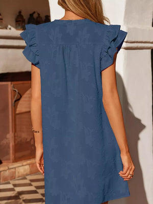 Blue floral embossed mini dress with ruffled sleeves and button detail.