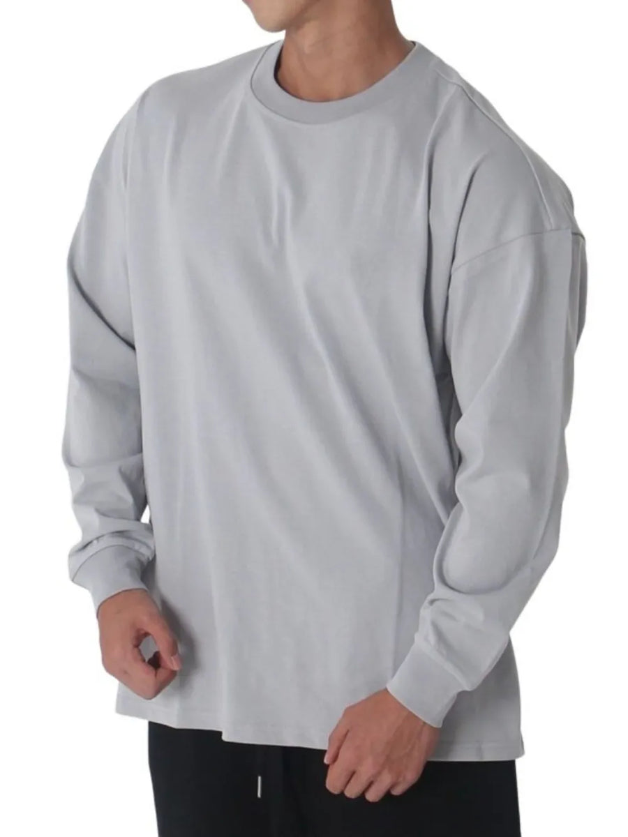 Oversized crewneck long sleeve t-shirt in gray washed cotton with a relaxed fit.