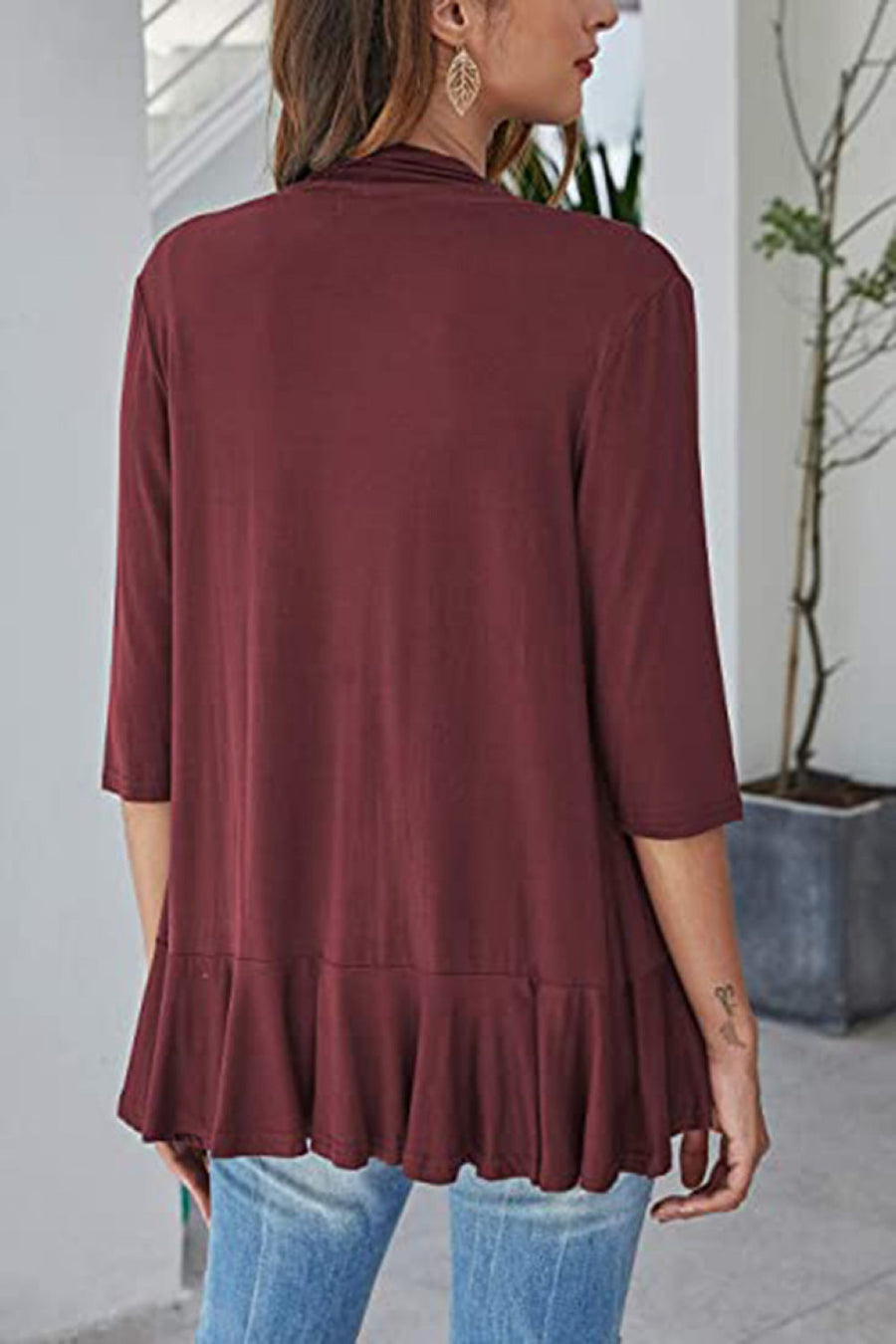 Burgundy waterfall cardigan with 3/4 sleeves and ruffled hemline.