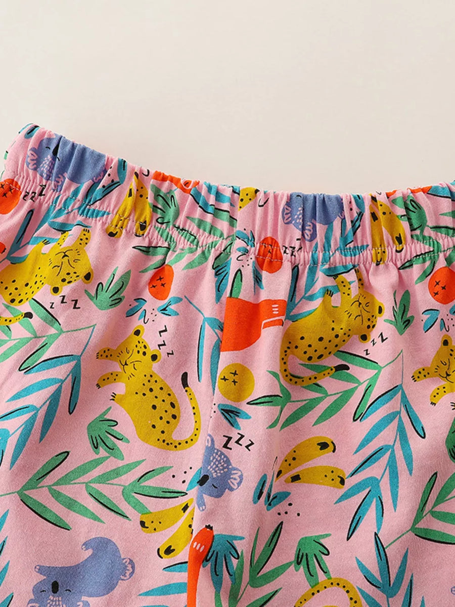 Toddler pink sleepwear set with animal print, featuring leopards and koalas.