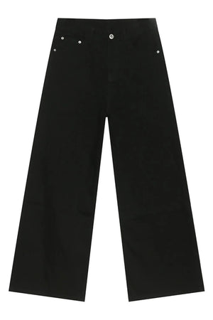 Black balloon leg jeans with a wide, straight cut and silver button details.