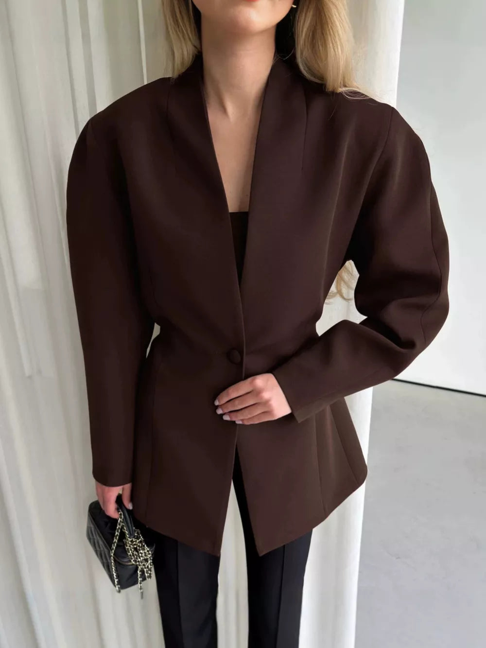 Black A-line blazer with deep v-neck