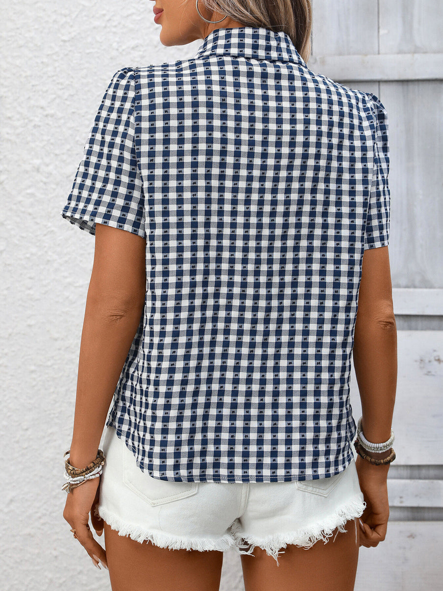 Dark blue and white gingham button-up short-sleeve shirt with a textured pattern, shown from the back.