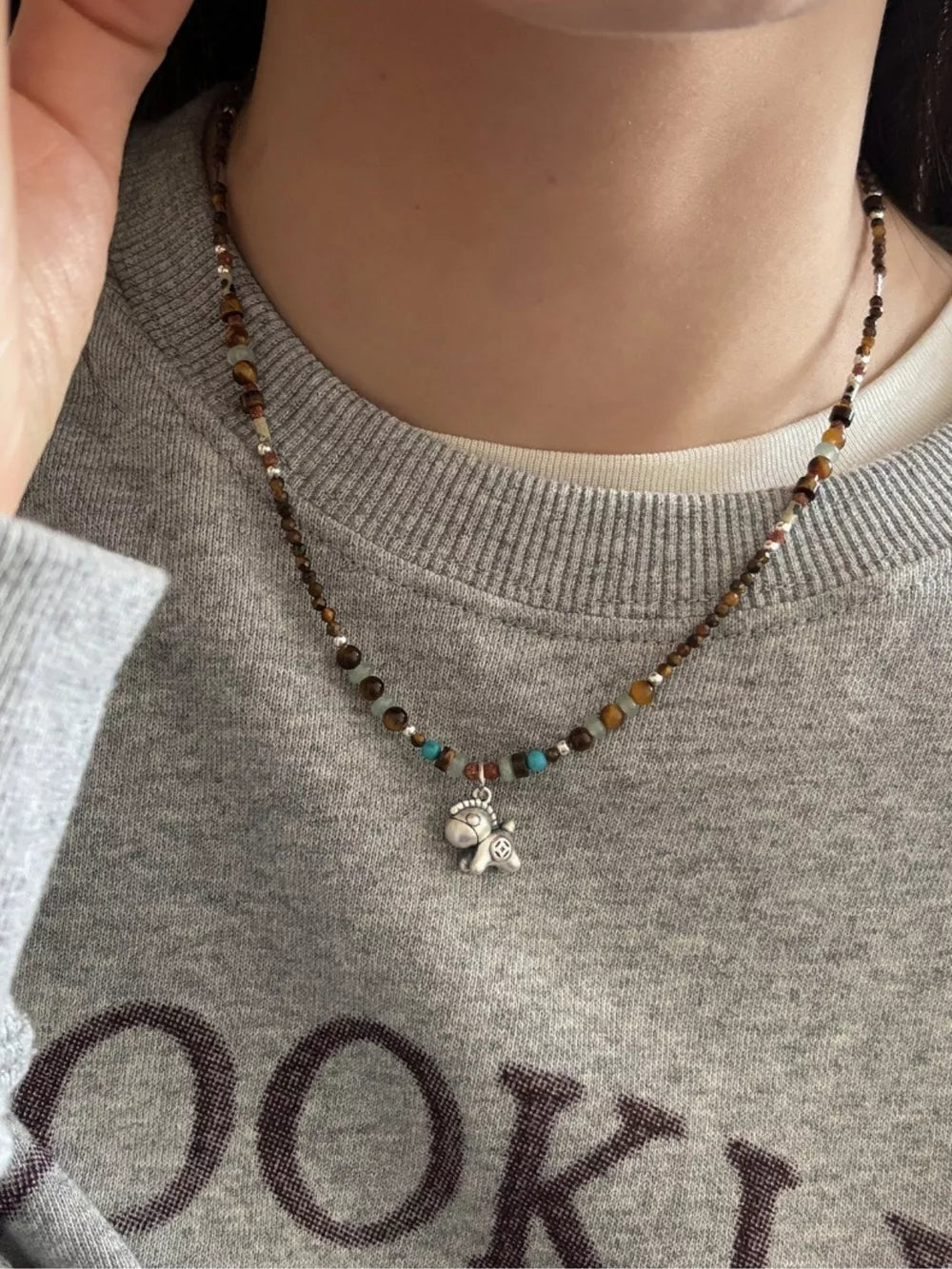 brown necklace with choker and clasp