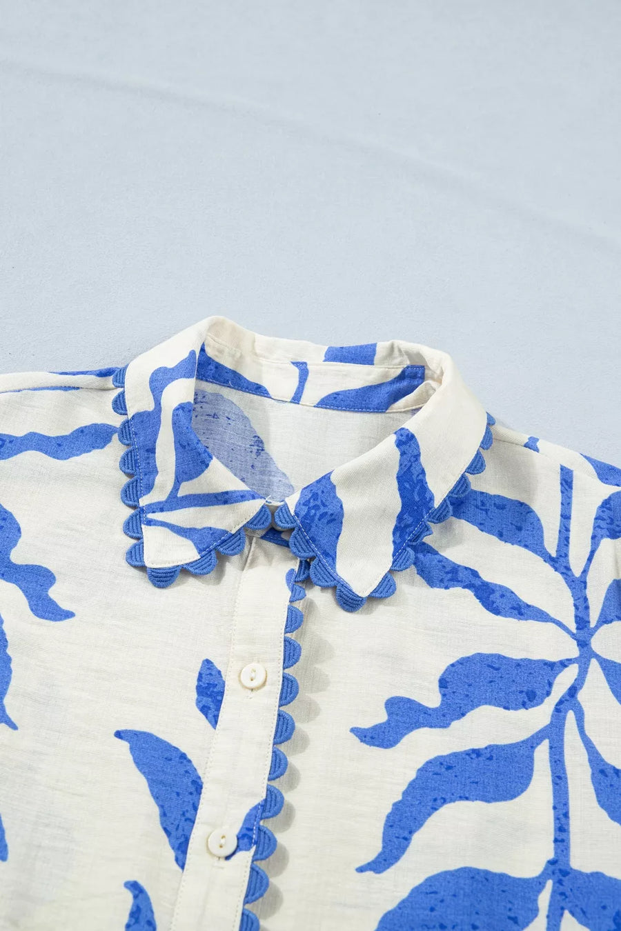 Botanical print button-down maxi dress with scalloped collar and cuffs in blue and white.