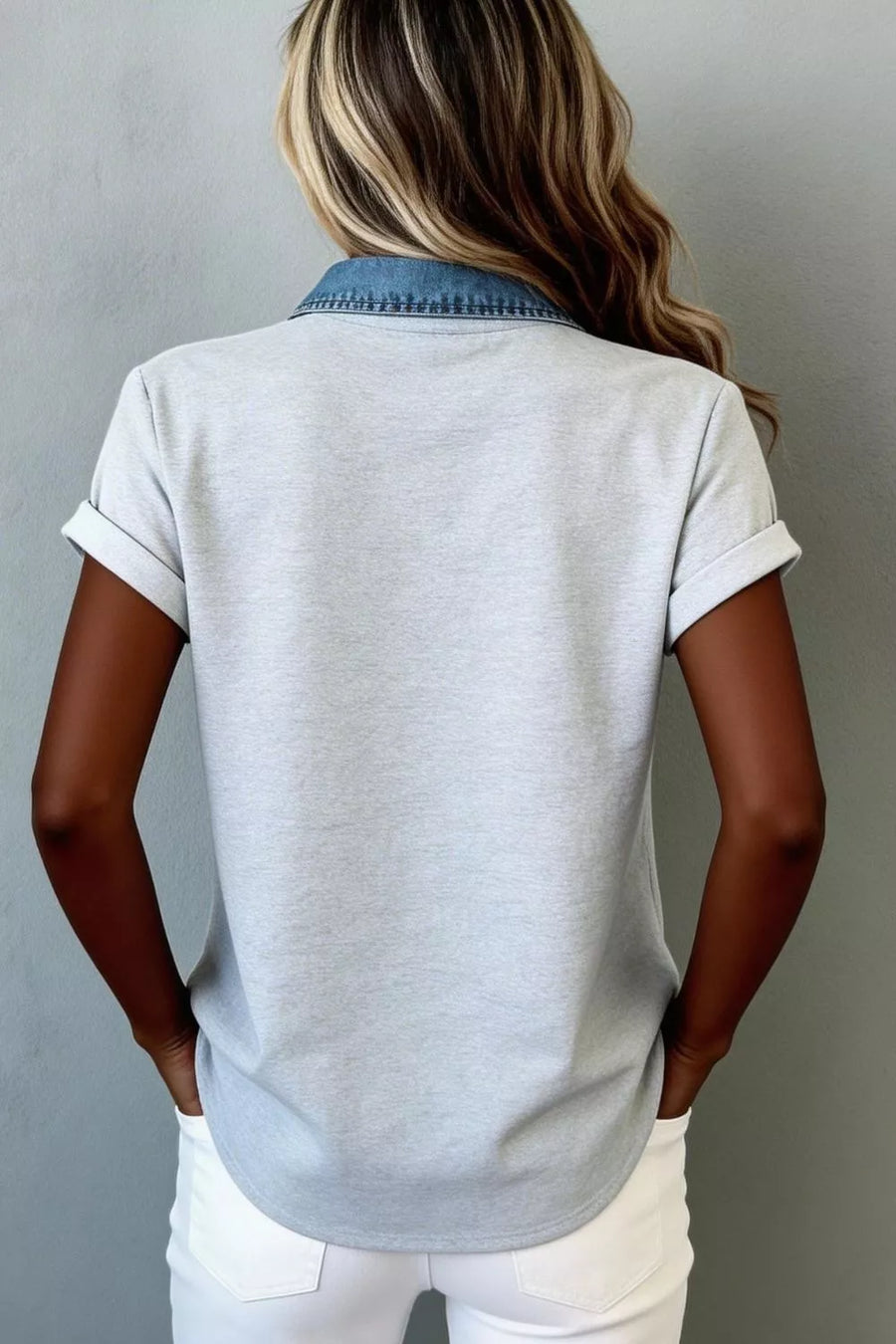 Light gray button-down overshirt with denim collar and cuffed short sleeves.
