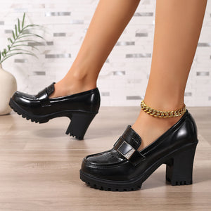 loafers in black with crocodile-embossed and chunky heel