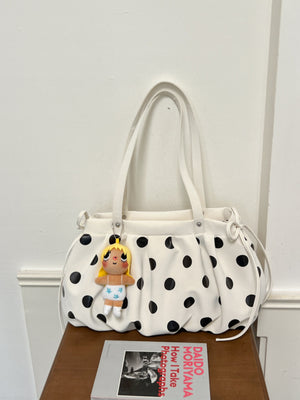 Drawstring Polka Dot Shoulder Bag in black with drawstring sides