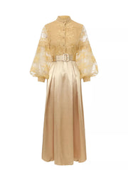 Gold lace maxi dress with lantern sleeves, button-down bodice, and belted waist.