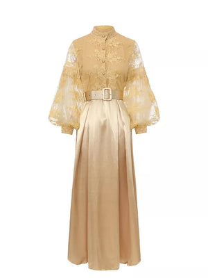 Gold lace maxi dress with lantern sleeves, button-down bodice, and belted waist.