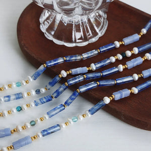 Lapis lazuli & pearl bead necklace with gold accents, light blue.