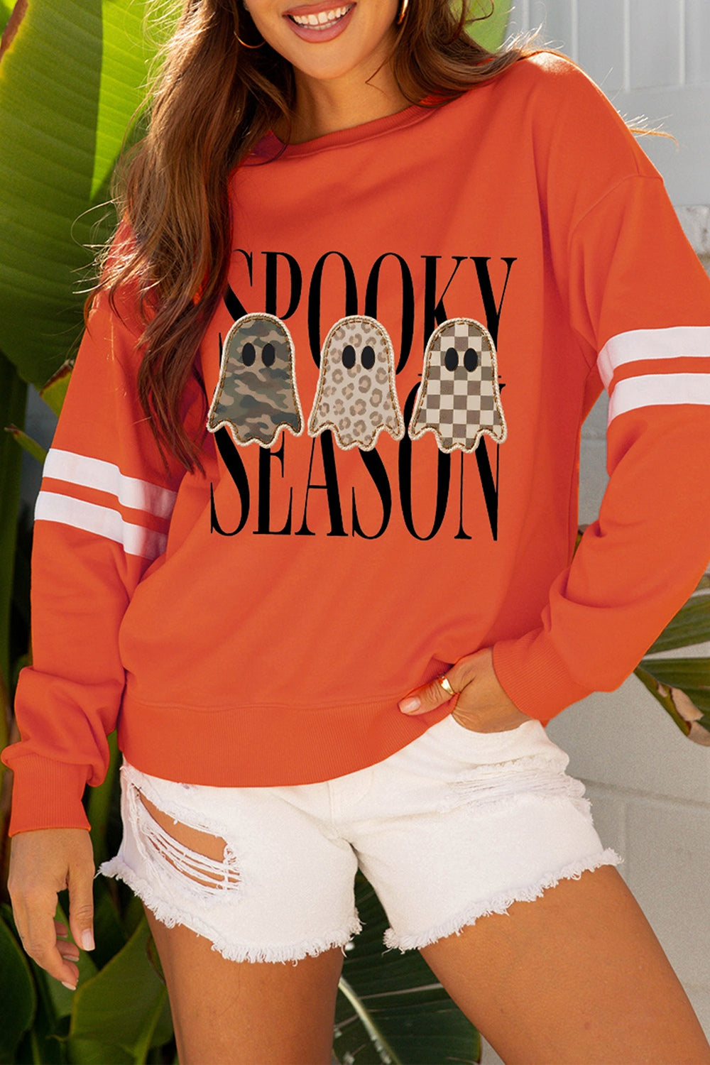 orange sweatshirt with striped and crew neck