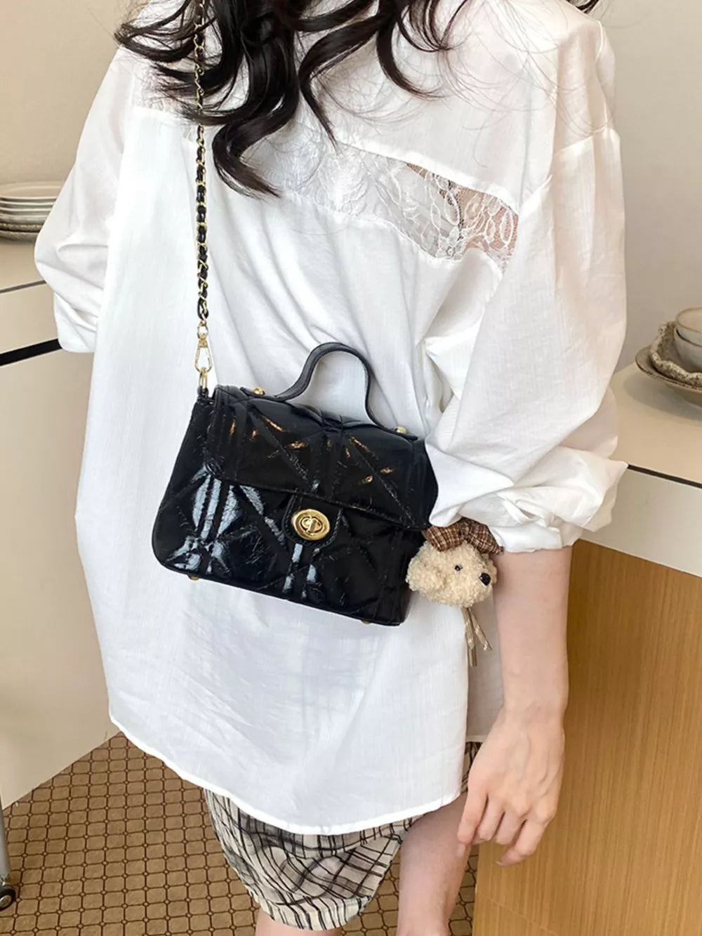 crossbody bag in black with quilted and small