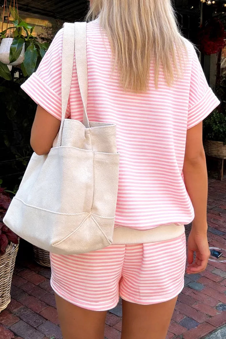 Pink and white striped knit shorts and matching short sleeve top with cuffed sleeves.