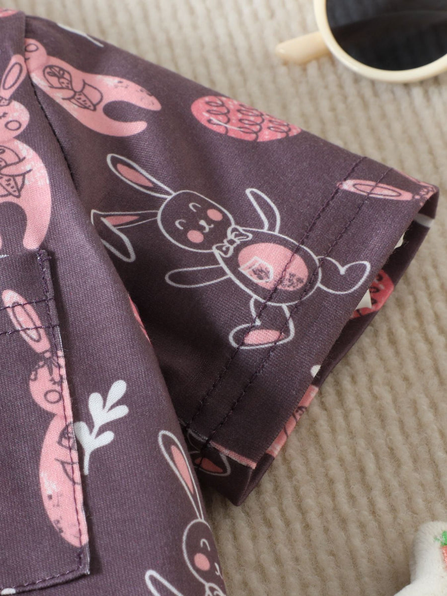 Baby short-sleeve shirt in plum with a pink bunny print, cotton fabric.