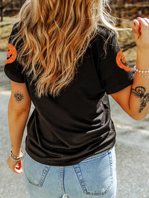 orange t-shirt featuring stretch and graphic print