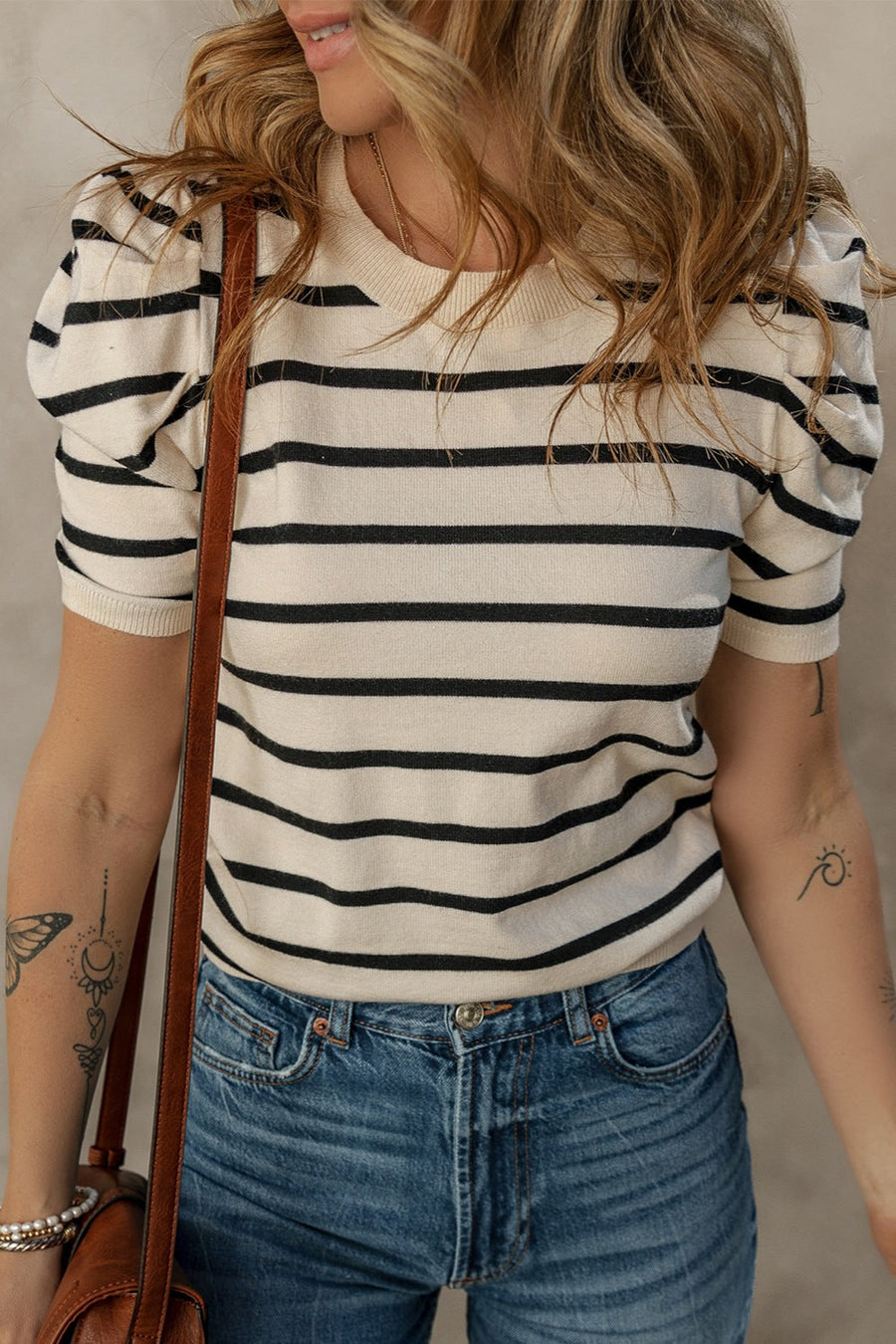 Puff sleeve breton knit top in cream with black stripes and crew neck.