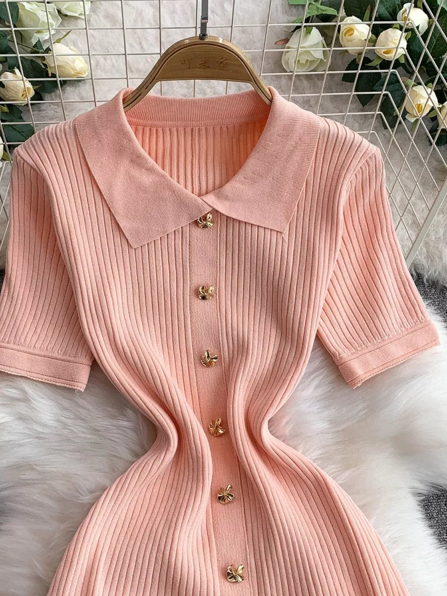 Pink ribbed knit midi dress with collar and gold button detail