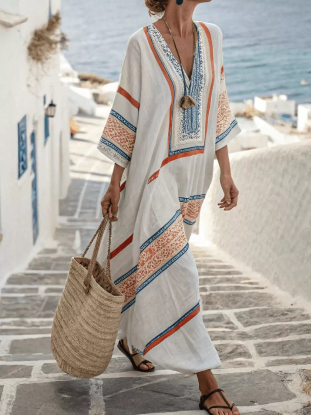 cream maxi dress with geometric and v-neck