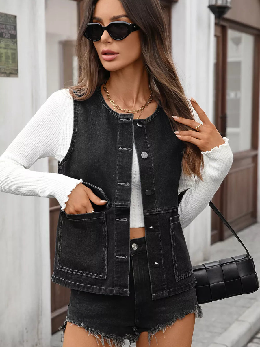 Black buttoned denim vest with collarless neckline and chest and hip pockets
