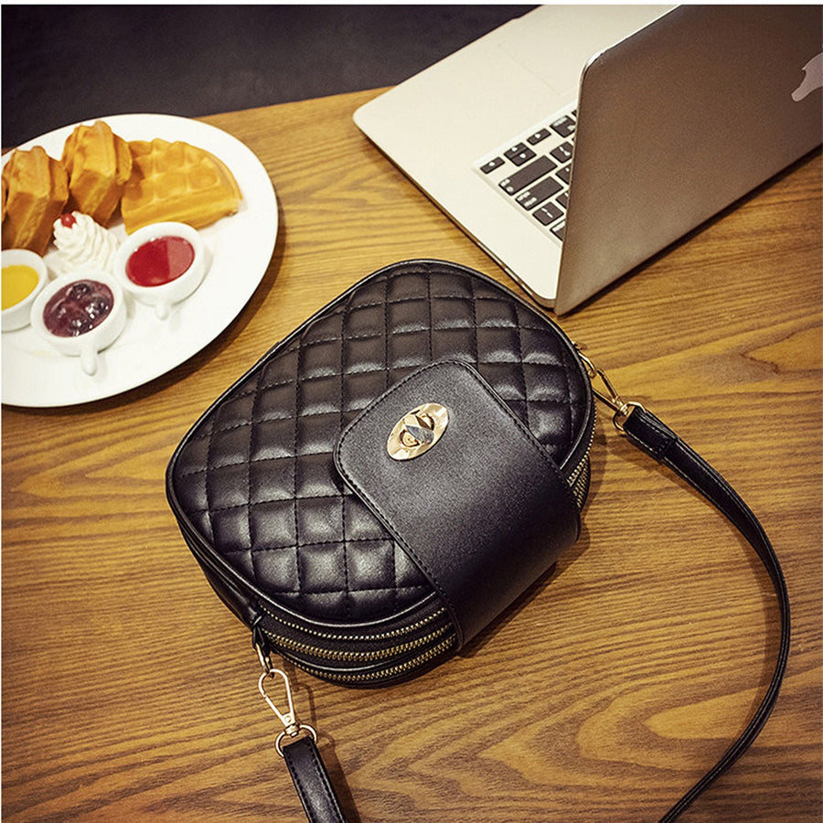 crossbody bag featuring quilted in Black with PU Leather Imported Size &amp texture