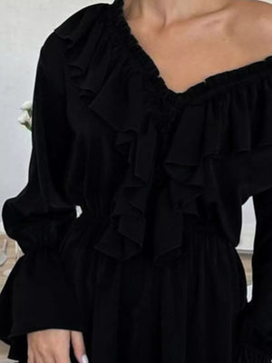 Black mini dress with ruffled and bishop sleeve