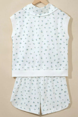 White floral print sleeveless top with collar and matching shorts
