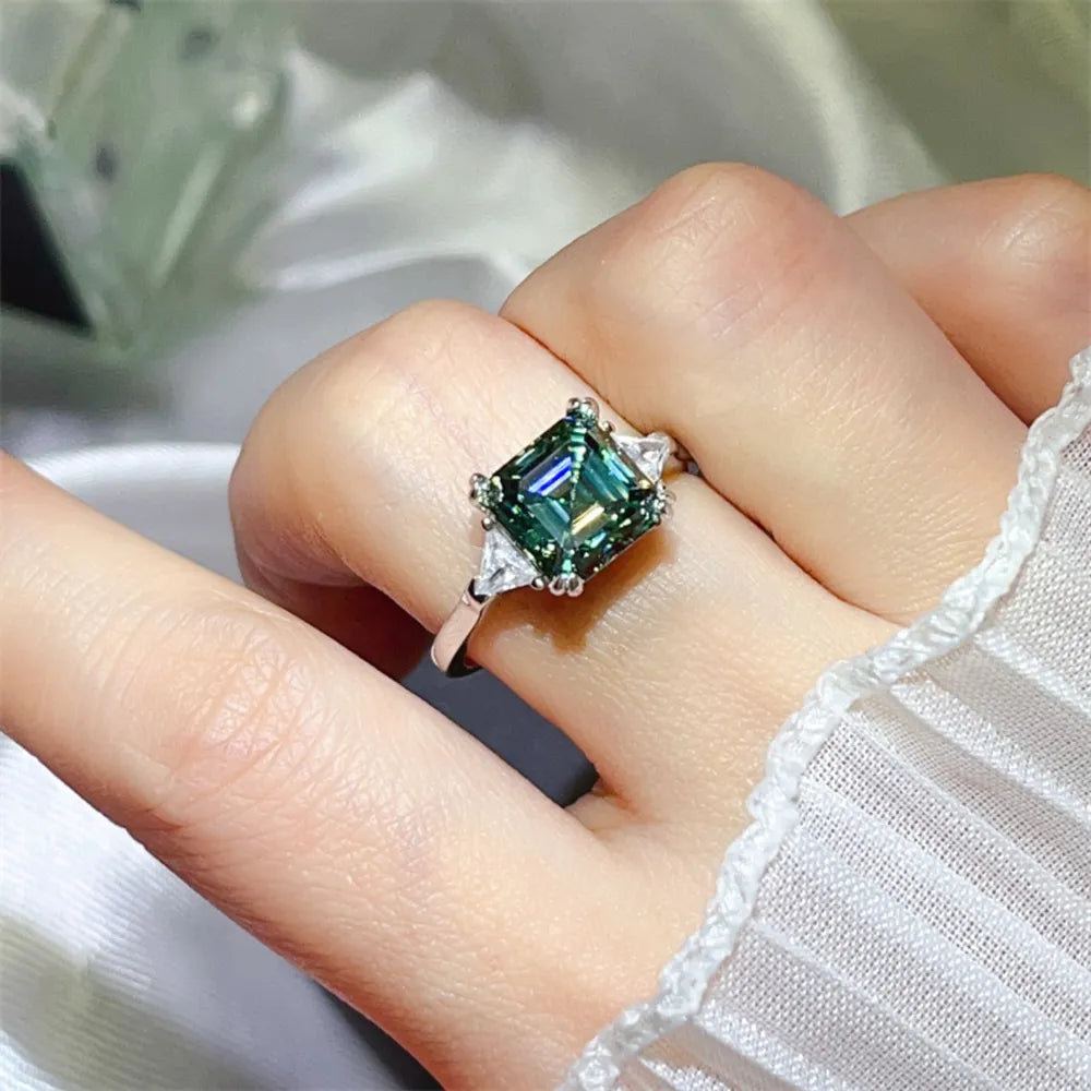 ring in deep green featuring center stone and statement fit
