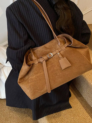 Brown suede shoulder bag with buckle detail and leather trim
